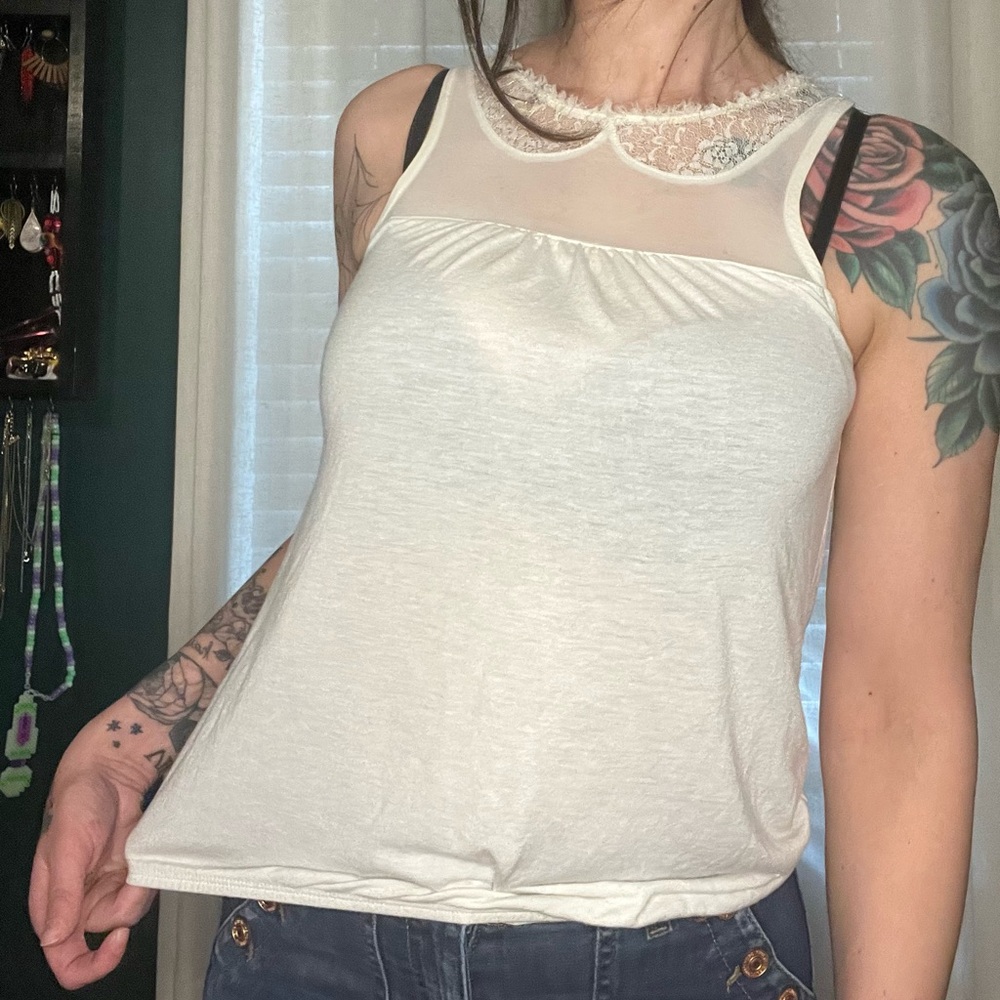 Cream sleeveless top with mesh/lace collar